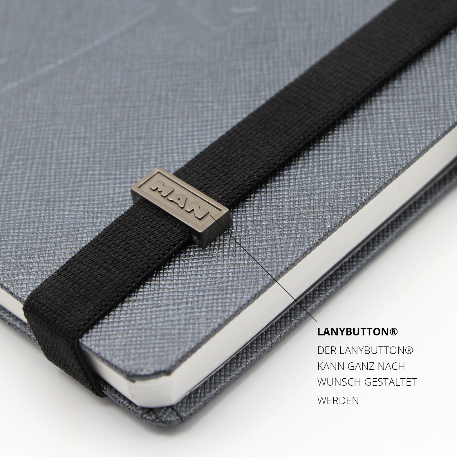 Lanybutton® mit MAN-Logo am elastischen Lanyband®, als hochwertiges Brandingelement