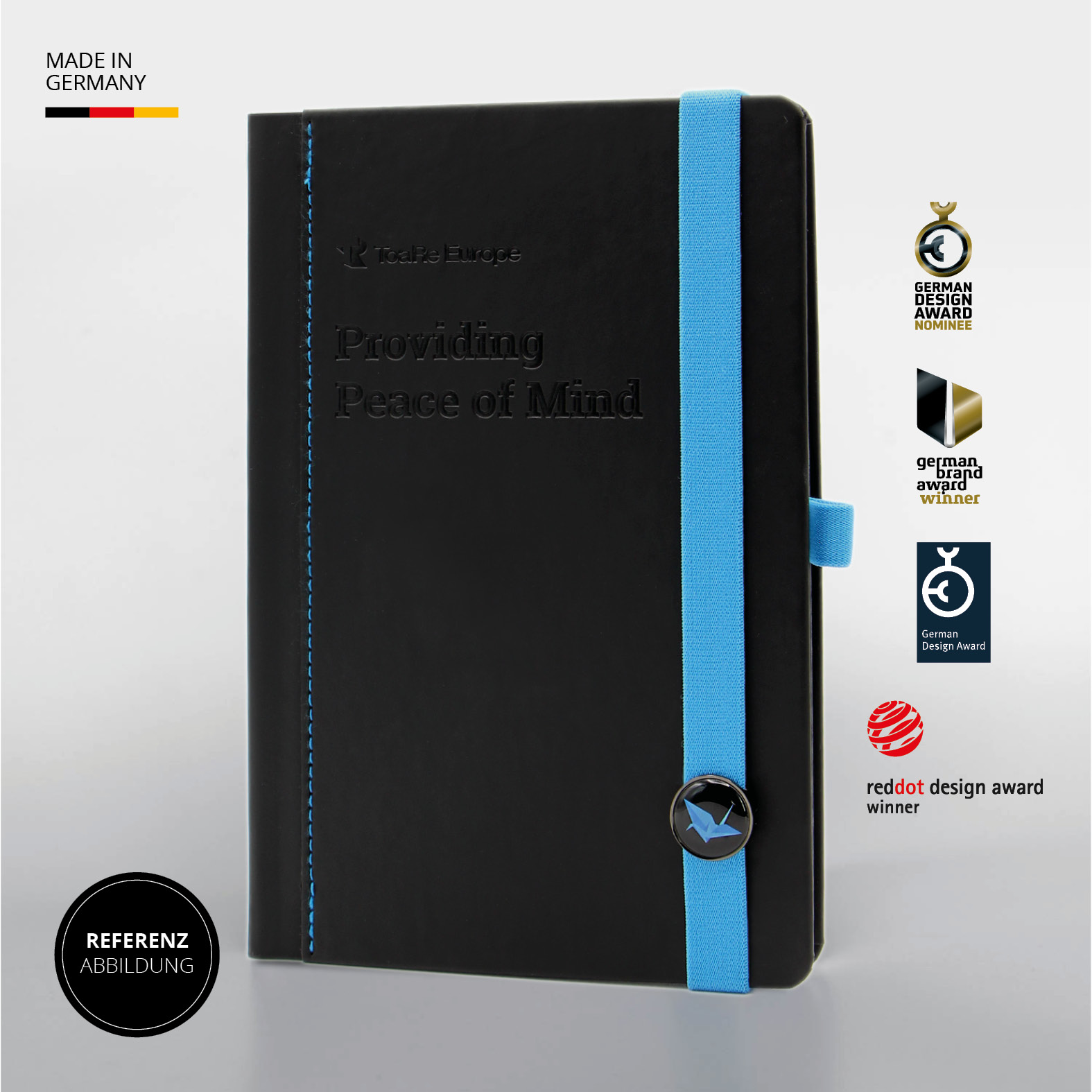 Schwarzes Notizbuch ToaRe Europe mit blauem Lanyband und Prägung, ausgezeichnet mit vier Designpreisen, Made in Germany.