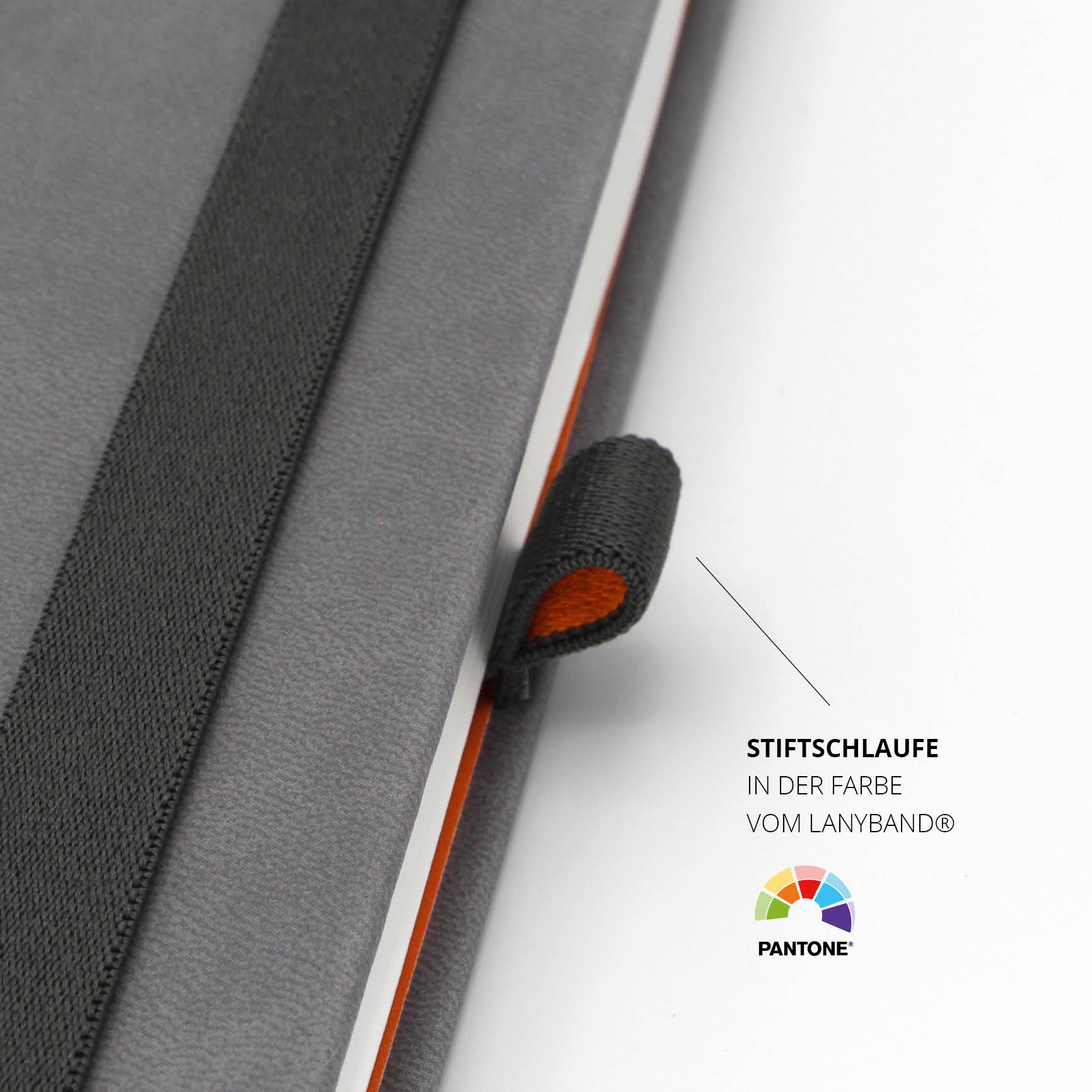 Detail der Stiftschlaufe an einem grauen Notizbuch – Personalisierbares Notizbuch mit robuster Stiftschlaufe und Pantone-Farbanpassung für Corporate Designs.