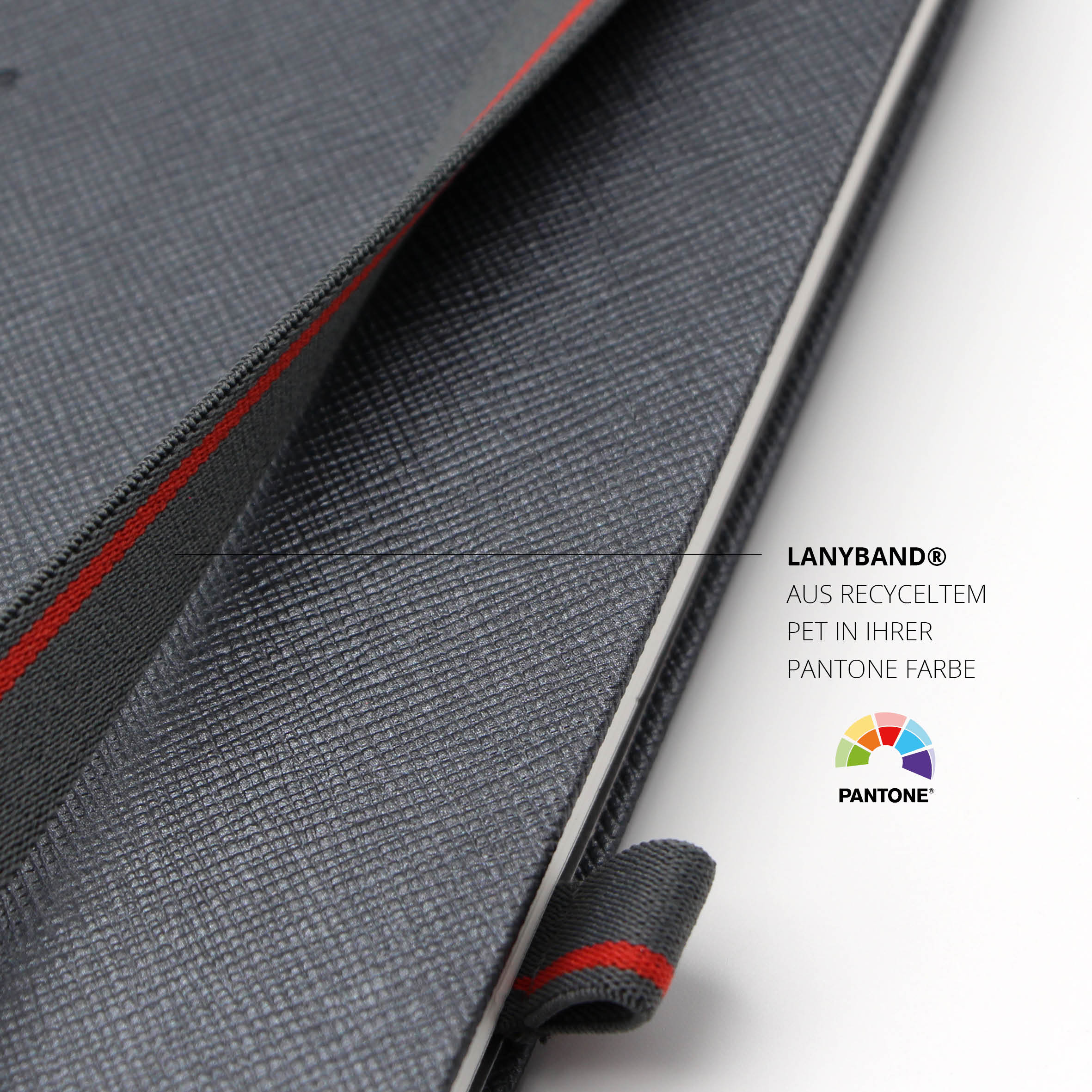 Individuelles Lanyband aus recyceltem PET in Grau und Rot am Lanybook Notizbuch