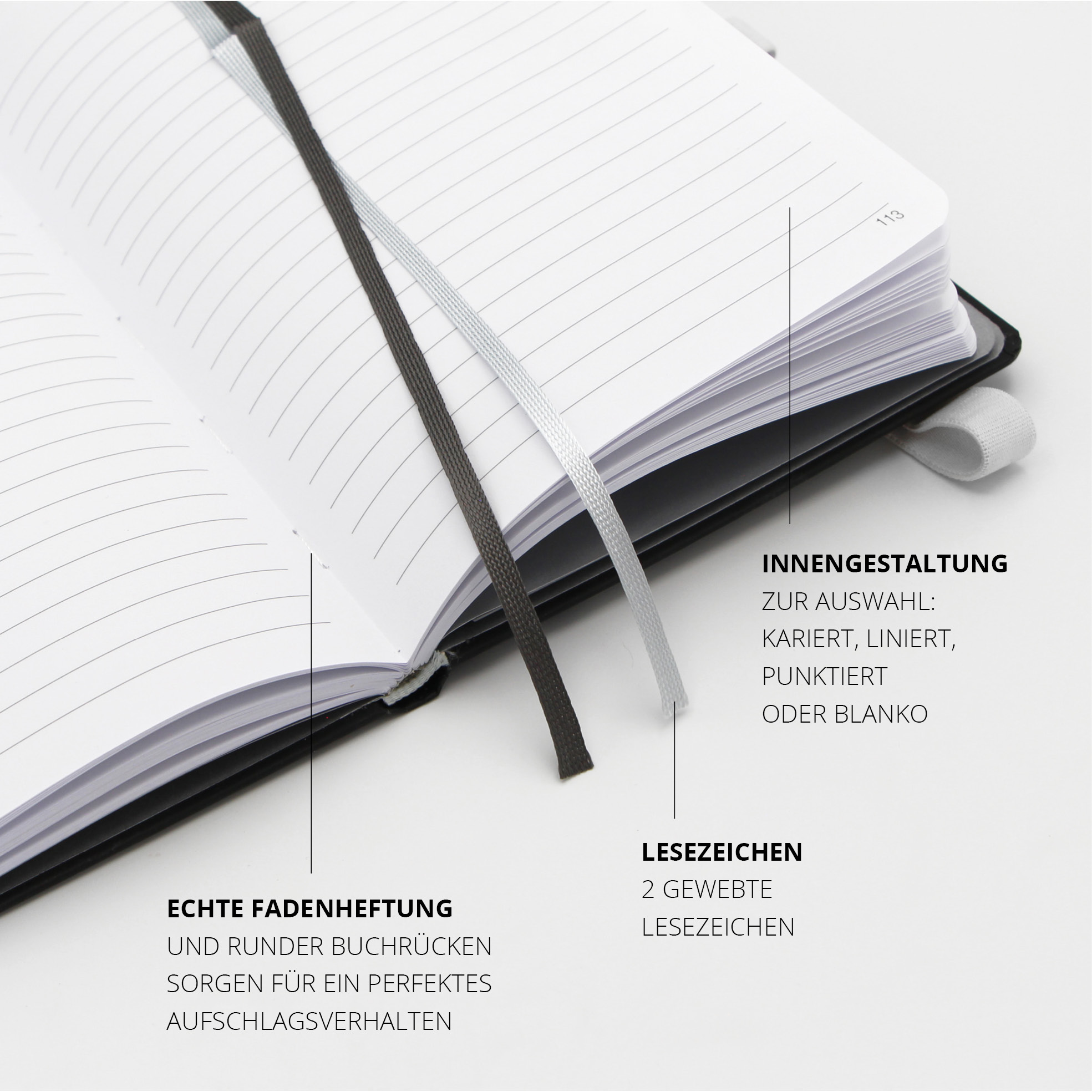 Innenansicht: liniertes Recyclingpapier, 2 Lesezeichen, runder Buchrücken.