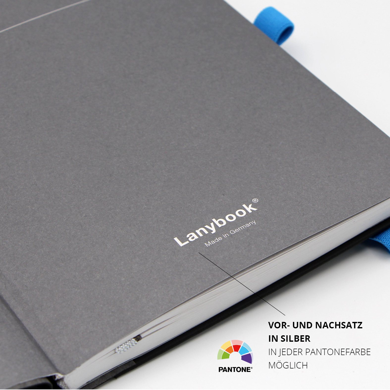Graues Vorsatzpapier mit silbernem Aufdruck „Lanybook – Made in Germany“, auch in Pantonefarben möglich.
