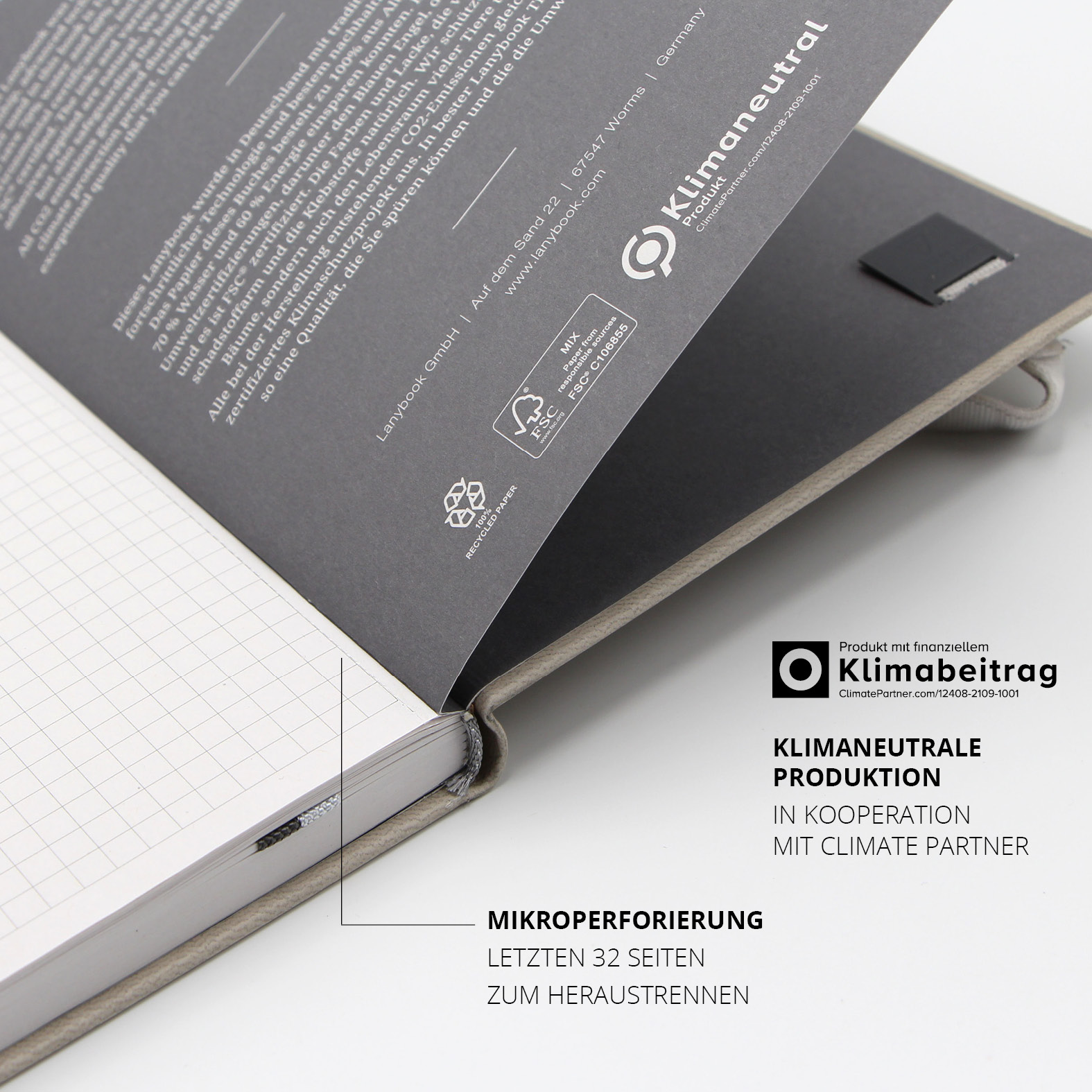 Innenansicht mit Hinweis auf Mikroperforation der letzten 32 Seiten und klimaneutrale Produktion in Kooperation mit Climate Partner.