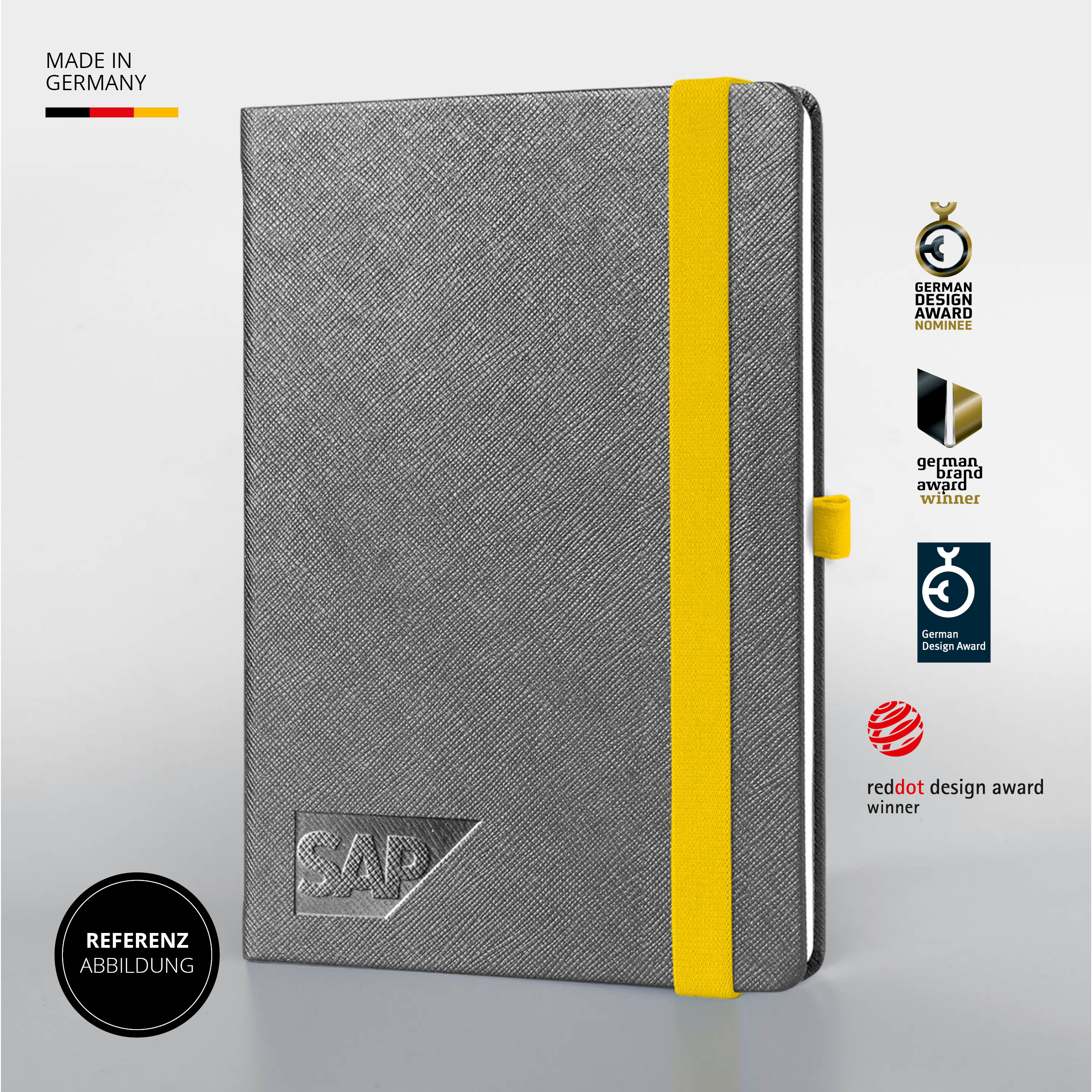 SAP Notizbuch mit grauem Einband, gelbem Lanyband® und SAP-Prägung – Made in Germany.