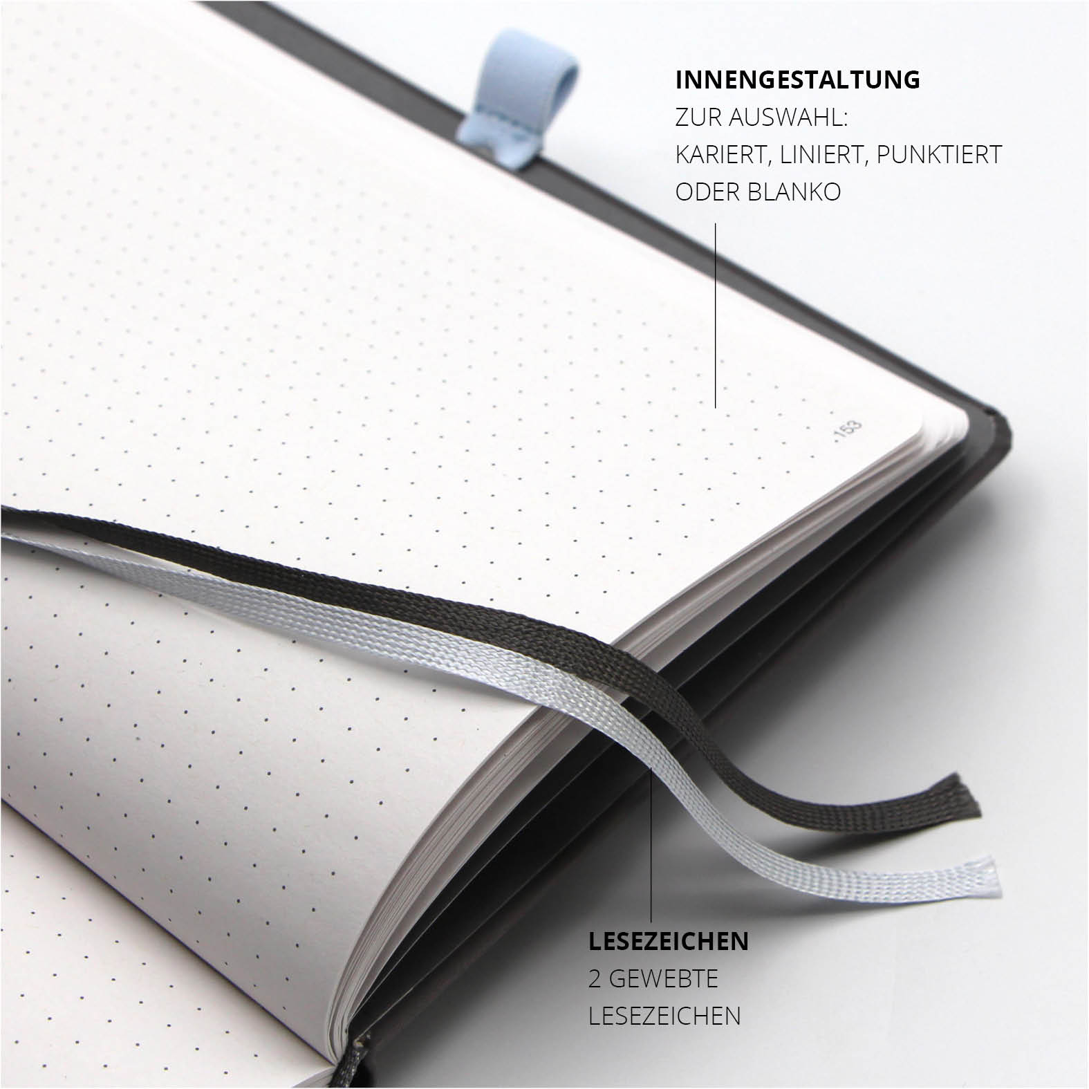 Innenansicht des Lanybook® Nature mit zwei gewebten Lesezeichen und punktierter Innengestaltung, ideal für strukturierte Notizen und Projektarbeit.