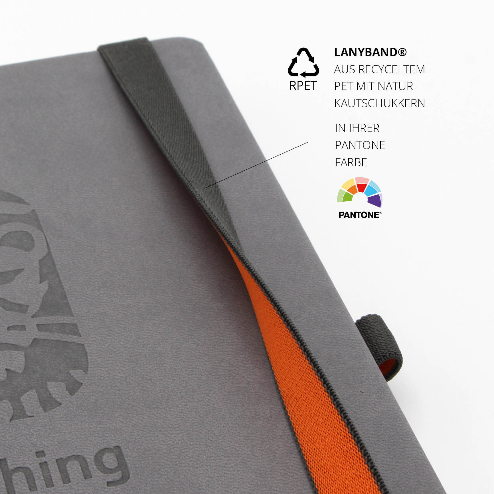 Graues ING Notizbuch mit schwarzem Lanyband® und Naturkautschukkern – Nachhaltiges Material trifft auf innovative Verarbeitung.