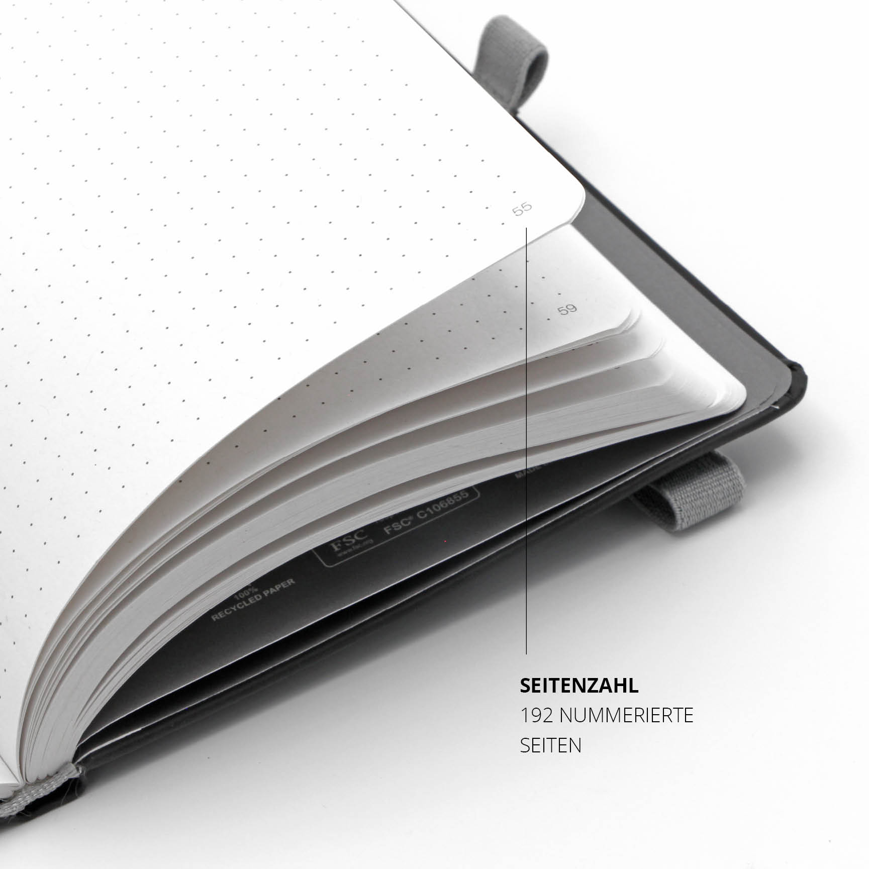 Geöffnetes Microsoft Notizbuch mit 192 nummerierten Seiten. Punktraster für flexibles Schreiben und nachhaltiges Recyclingpapier.