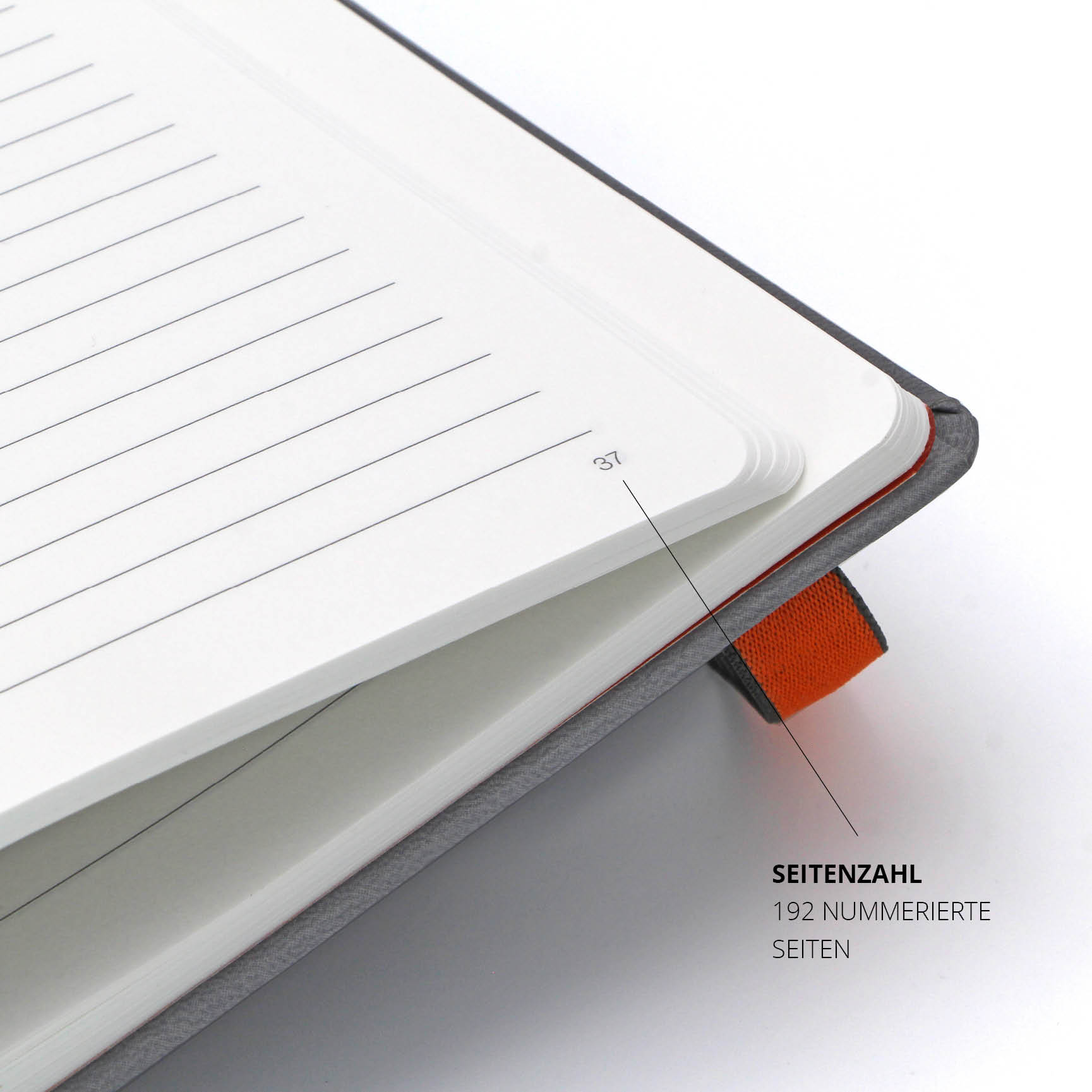 Detailansicht eines aufgeschlagenen grauen ING Notizbuchs – Premium-Notizbuch mit 192 nummerierten Seiten und eleganter Linienführung für strukturiertes Schreiben.